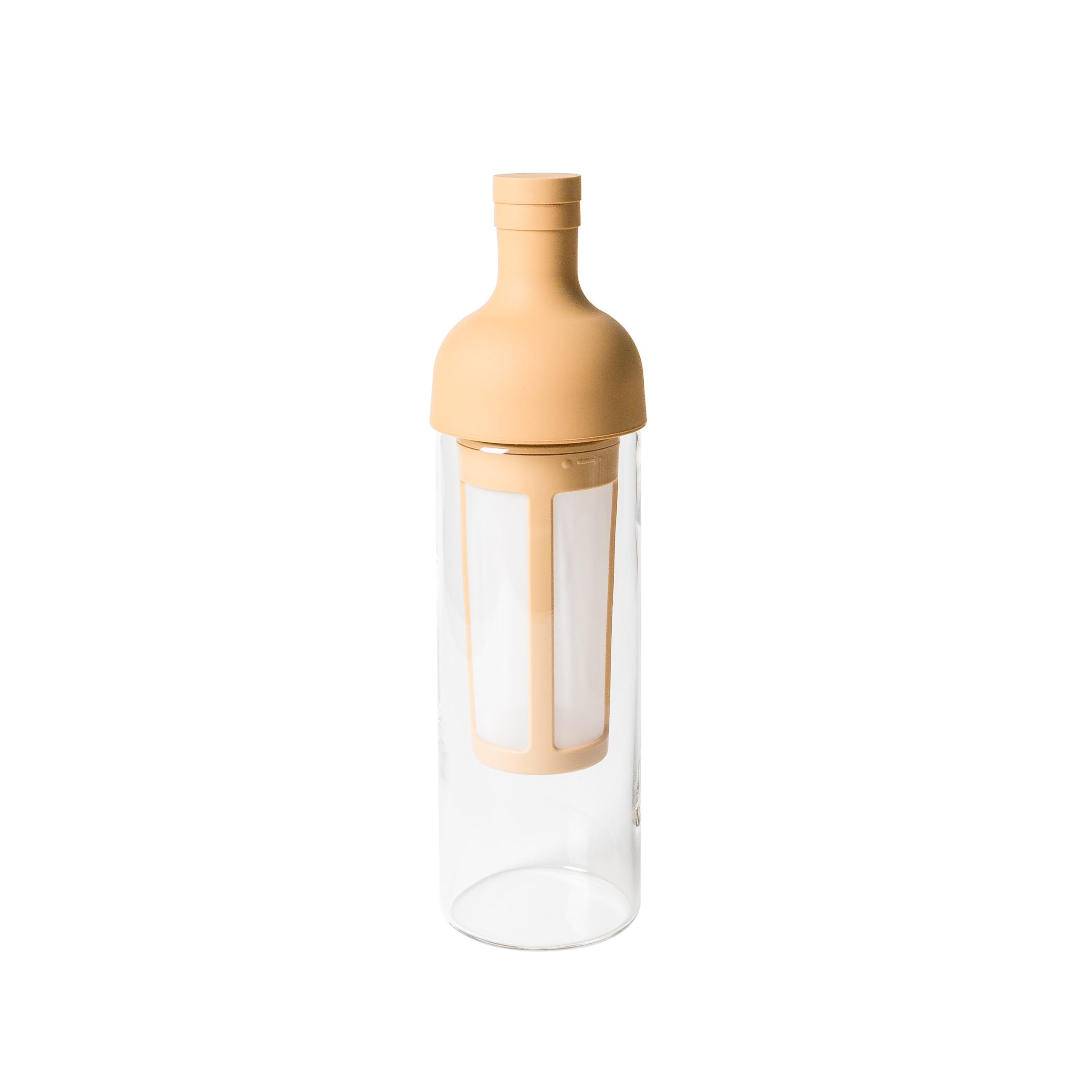 Clear glass bottle with beige lid and base on a white background
