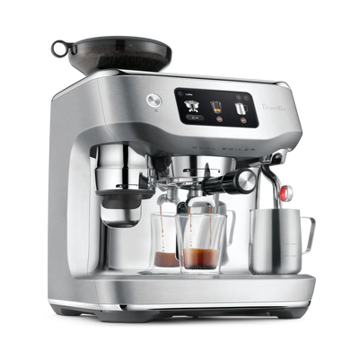 Silver Breville espresso machine on a white background