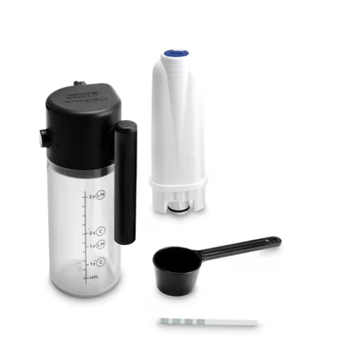 Clear milk container with black lid and handle, white cylindrical filter, water test strip, and black measuring spoon on a white background.