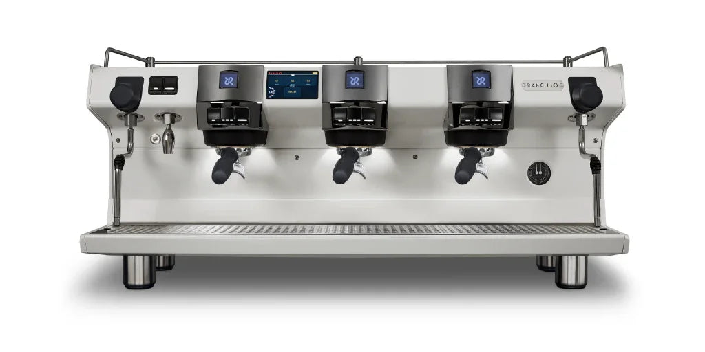 Commercial espresso machine with three groups on a white background
