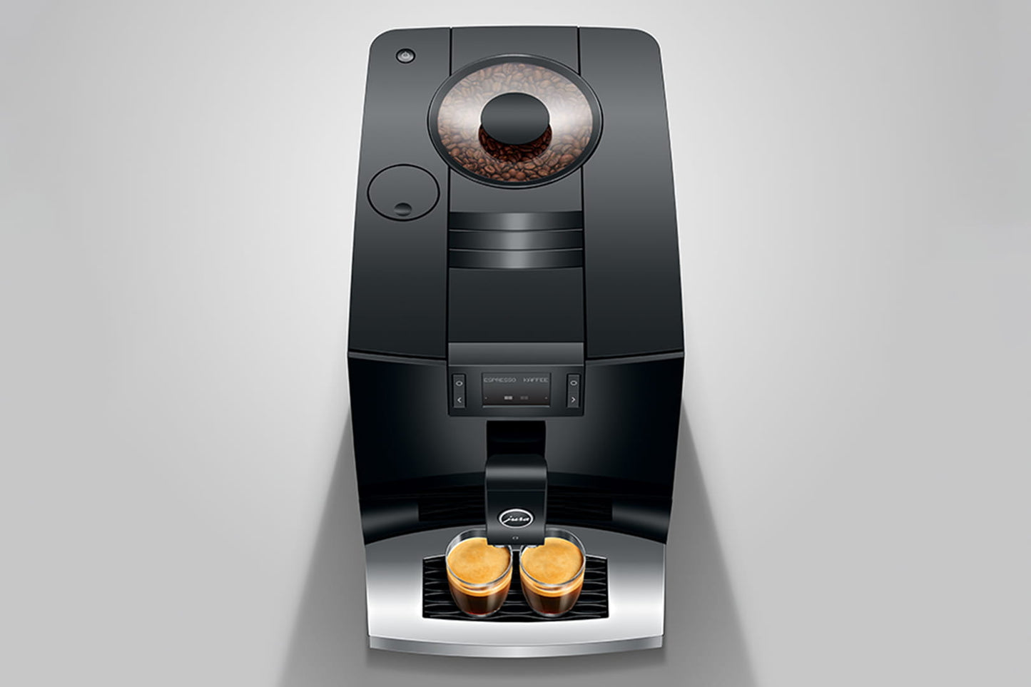 Modern coffee machine with two coffee pods on a gray background