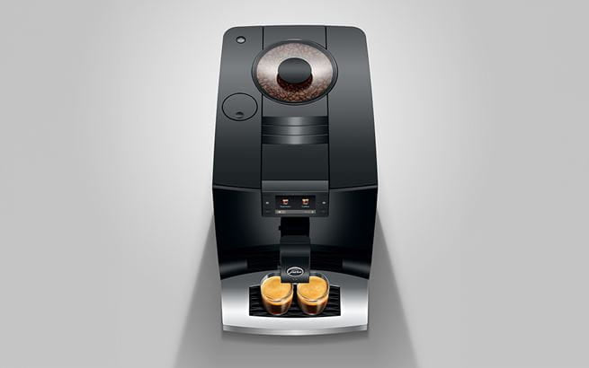 Black coffee machine on a gray background