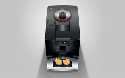 Black coffee machine on a gray background
