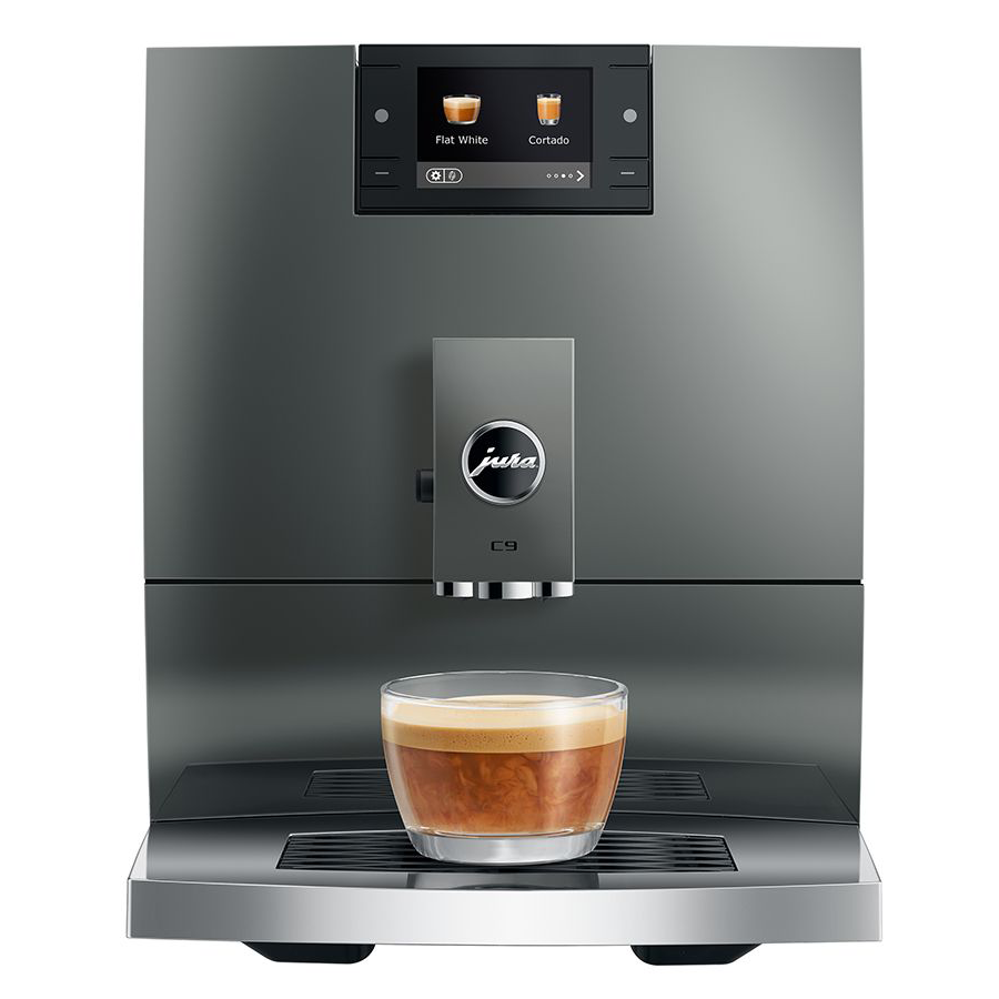 Modern coffee machine with a glass of coffee on a white background