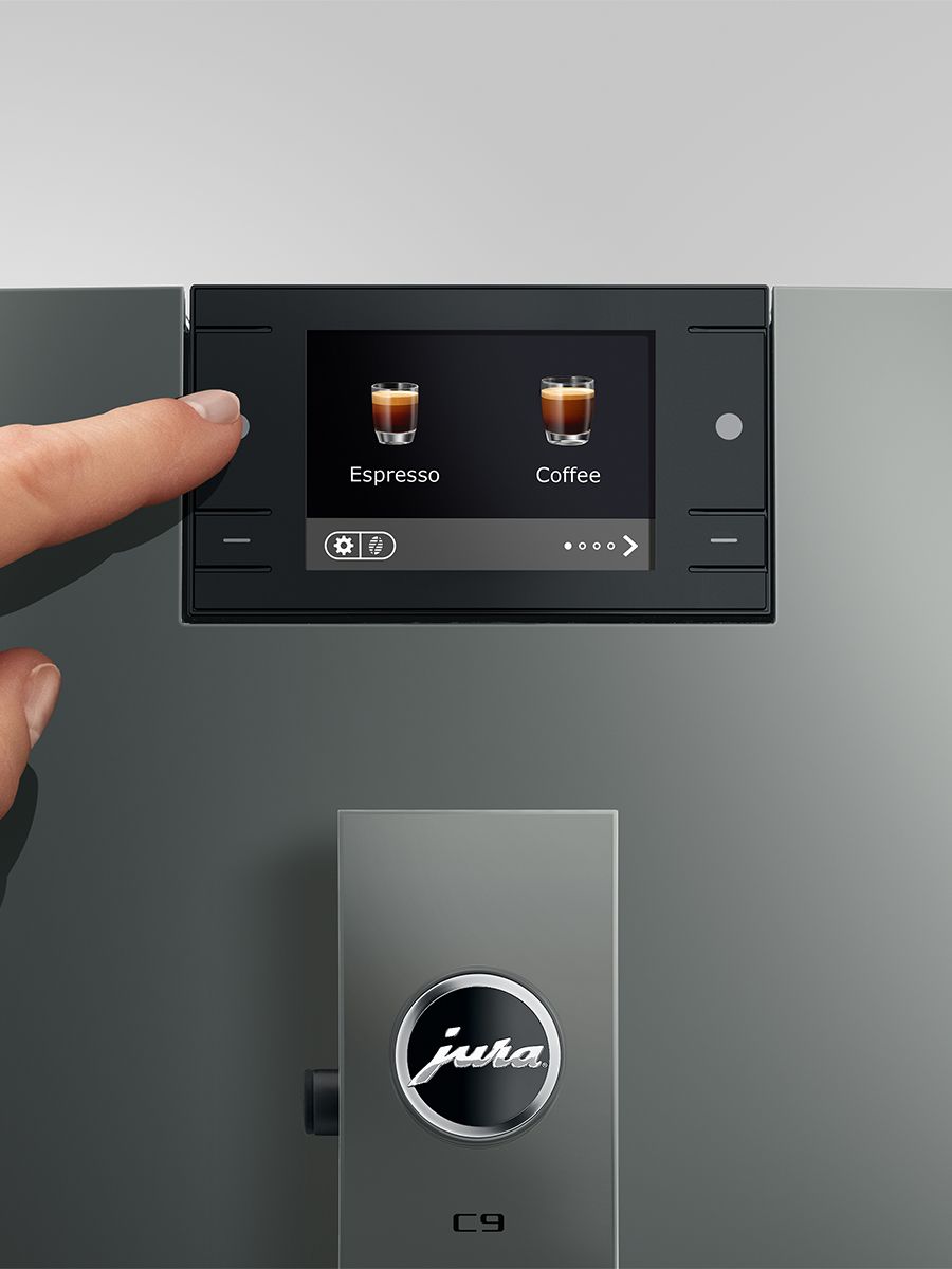 Coffee machine with touchscreen interface and Jura logo