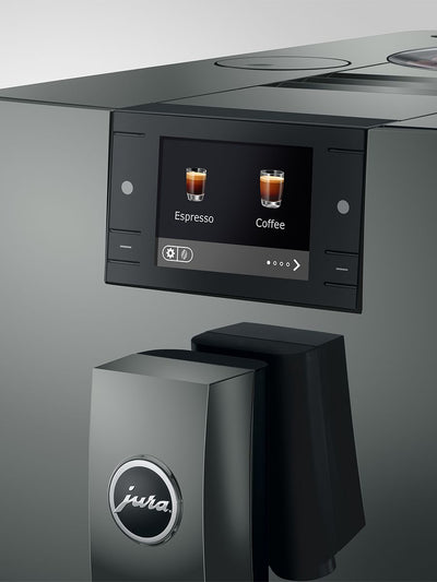 Jura coffee machine with digital display on a gray background
