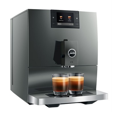 Modern coffee machine with two glasses of coffee on a white background