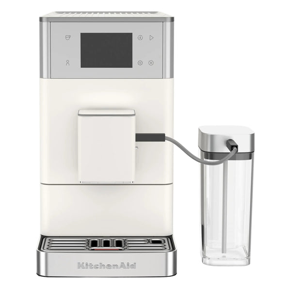 White coffee machine with a clear carafe on a white background, featuring the KitchenAid brand.