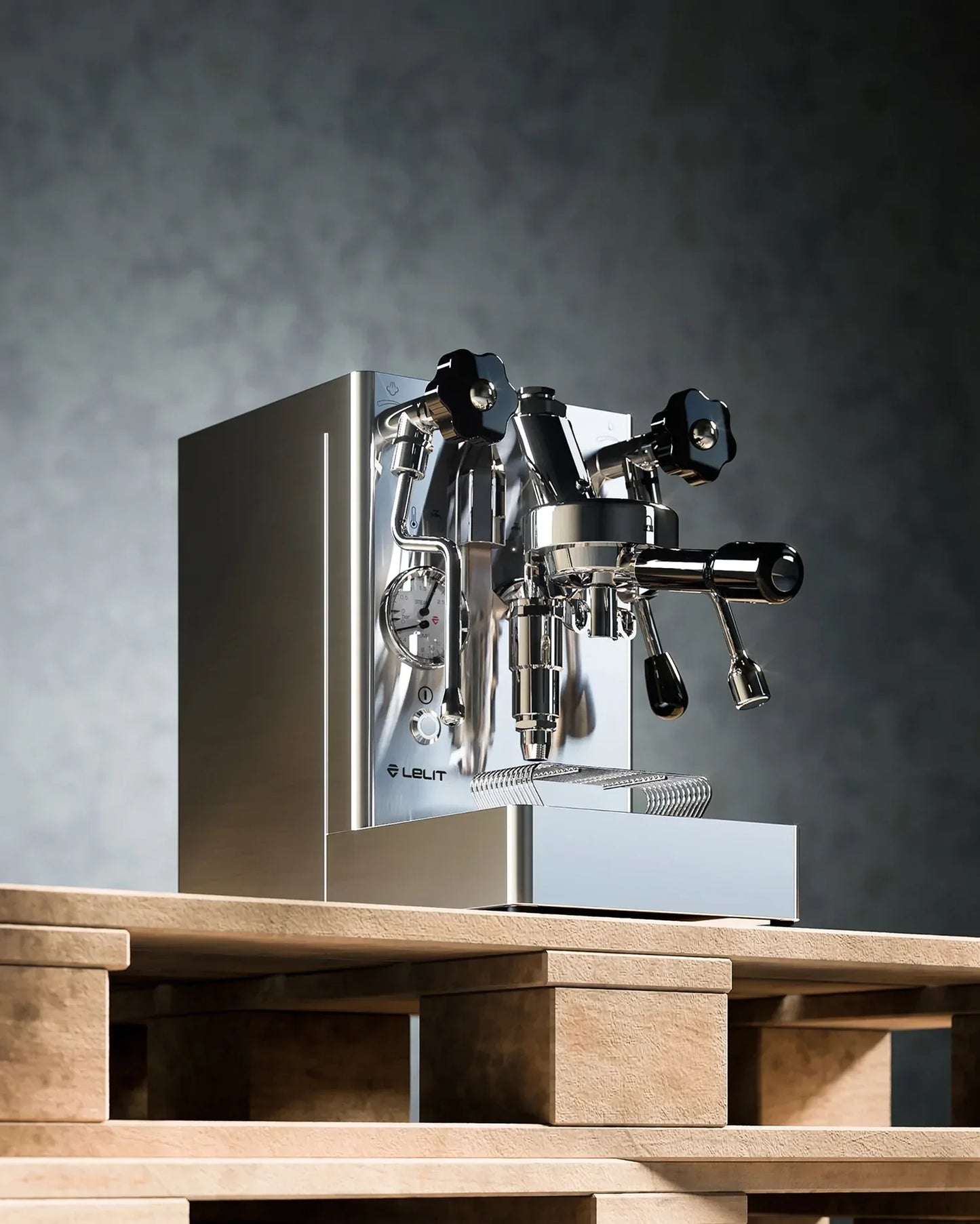 Silver espresso machine on a wooden platform with a gray background