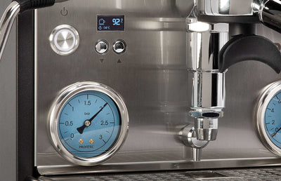 Stainless steel espresso machine with a pressure gauge and digital display.