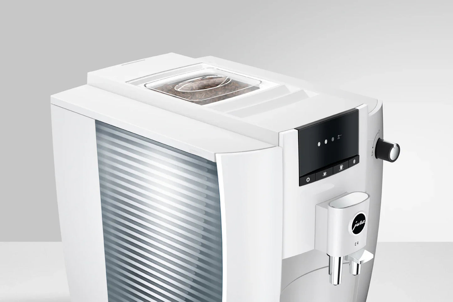 White coffee machine with digital display on a light gray background