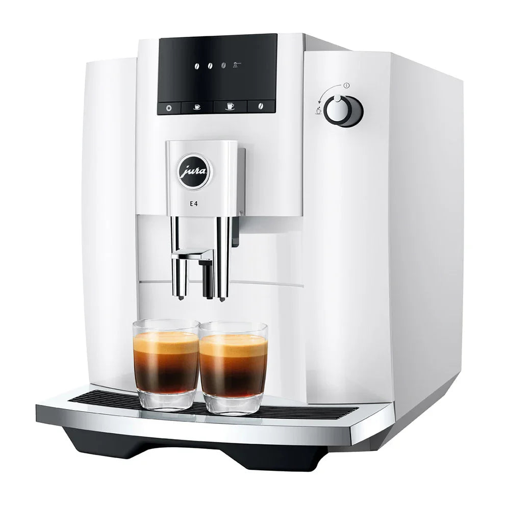 White coffee machine with two glasses of coffee on a white background
