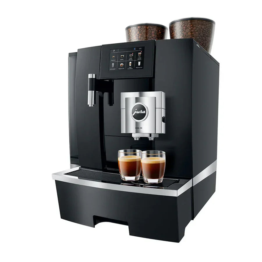 Black coffee machine with two glasses of coffee on a white background