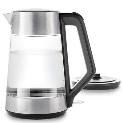 Modern electric kettle with clear glass body and black handle on a white background