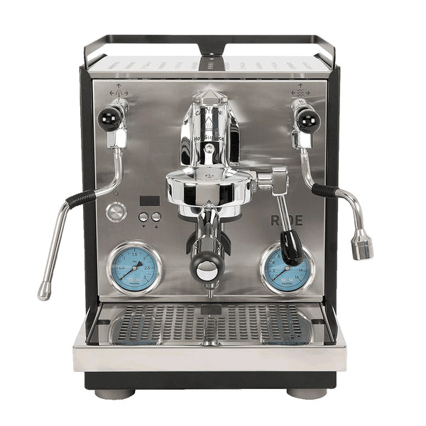 A professional semi-automatic espresso machine with a stainless steel front panel, black side panels, two blue dials, and chrome-plated metal components, shown against a plain white background.