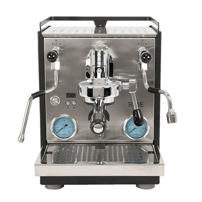 A professional semi-automatic espresso machine with a stainless steel front panel, black side panels, two blue dials, and chrome-plated metal components, shown against a plain white background.